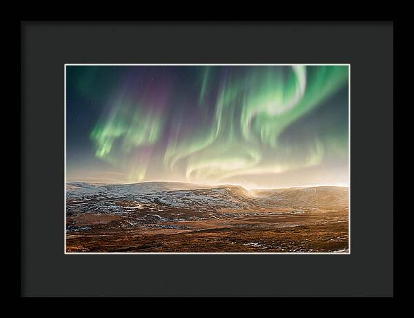 Aurora Swirling In Green And Purple