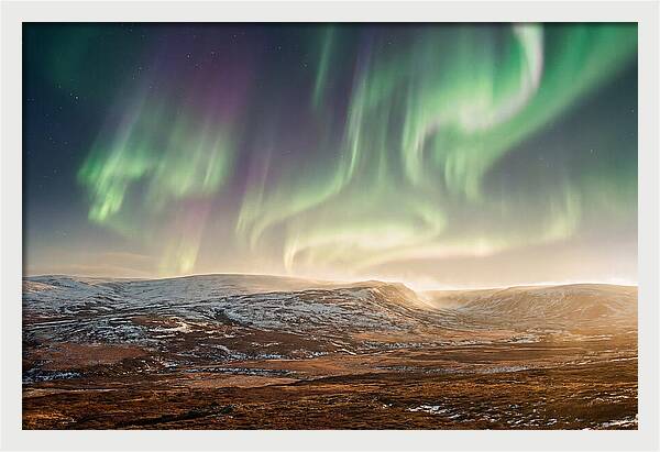 Aurora Swirling In Green And Purple