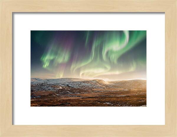 Aurora Swirling In Green And Purple