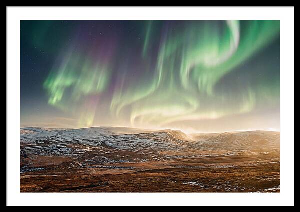 Aurora Swirling In Green And Purple