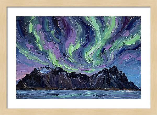 Auroras Above Towering Peaks