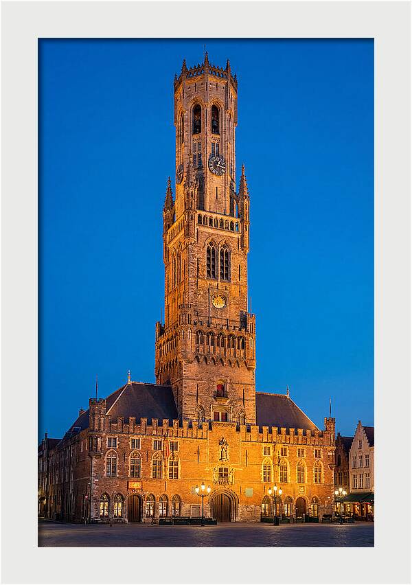 Belfry Tower Illuminated At Dusk