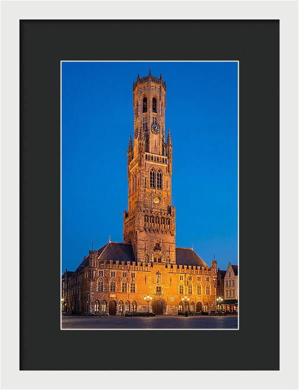 Belfry Tower Illuminated At Dusk