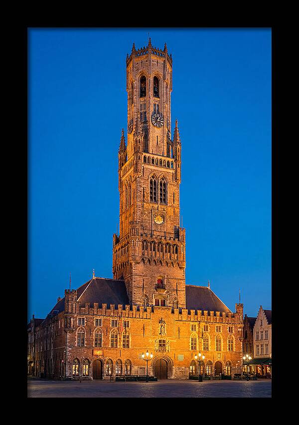 Belfry Tower Illuminated At Dusk
