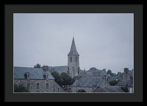 Bell Tower Rising Above Rooflines