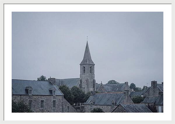 Bell Tower Rising Above Rooflines