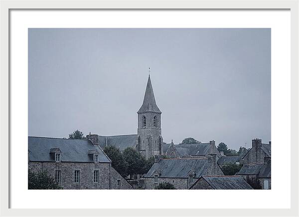Bell Tower Rising Above Rooflines