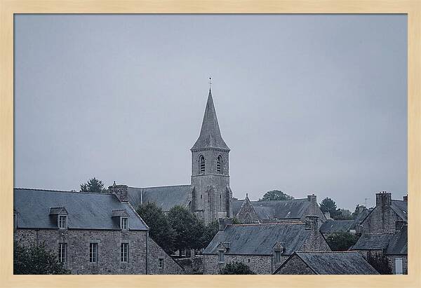 Bell Tower Rising Above Rooflines