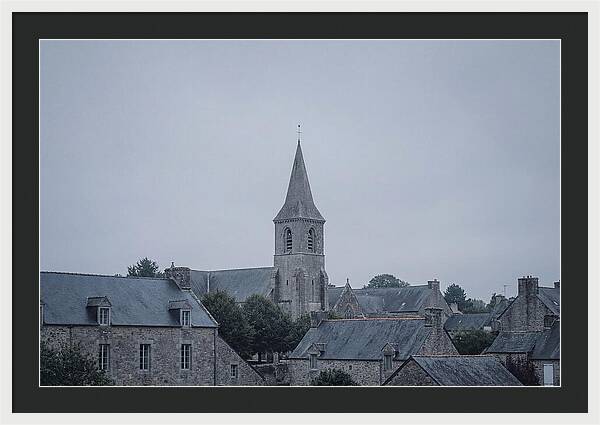 Bell Tower Rising Above Rooflines