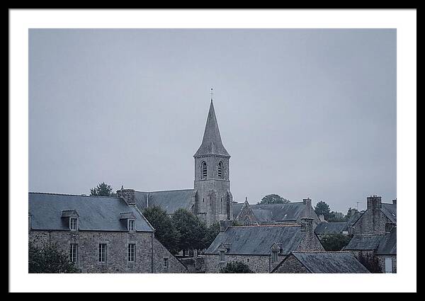 Bell Tower Rising Above Rooflines