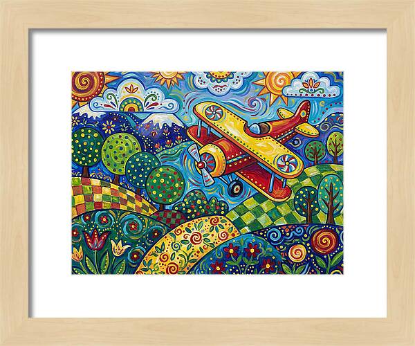 Biplane Over Colorful Landscape