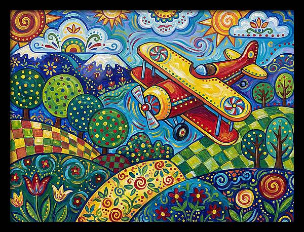 Biplane Over Colorful Landscape