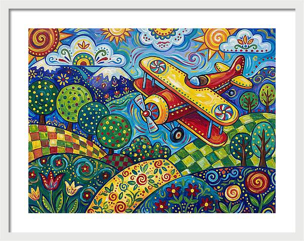 Biplane Over Colorful Landscape