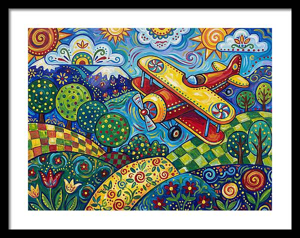 Biplane Over Colorful Landscape