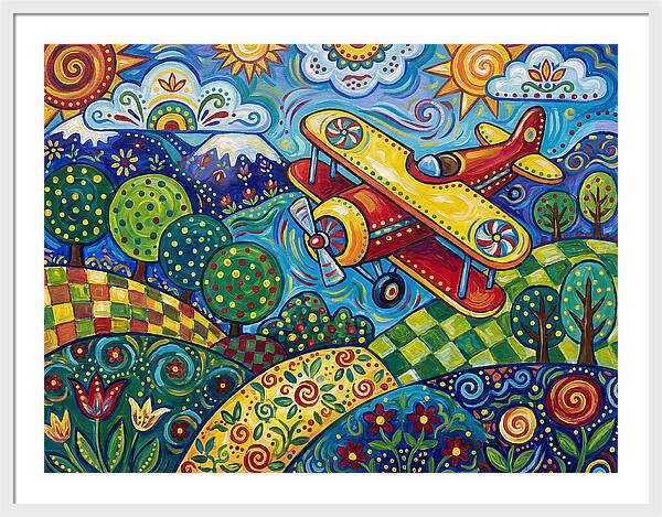 Biplane Over Colorful Landscape