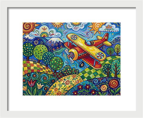Biplane Over Colorful Landscape