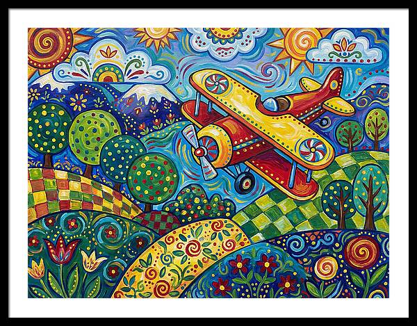 Biplane Over Colorful Landscape