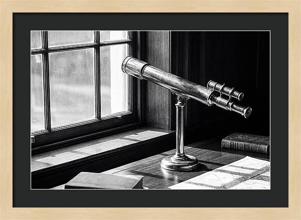 Brass Telescope On Mahogany Desk