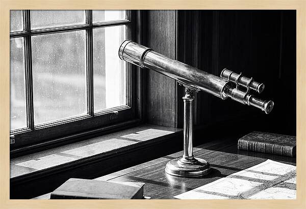 Brass Telescope On Mahogany Desk