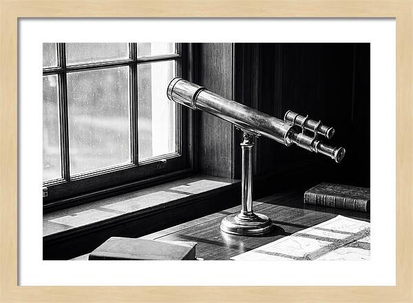Brass Telescope On Mahogany Desk