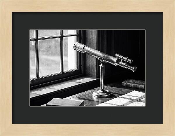 Brass Telescope On Mahogany Desk