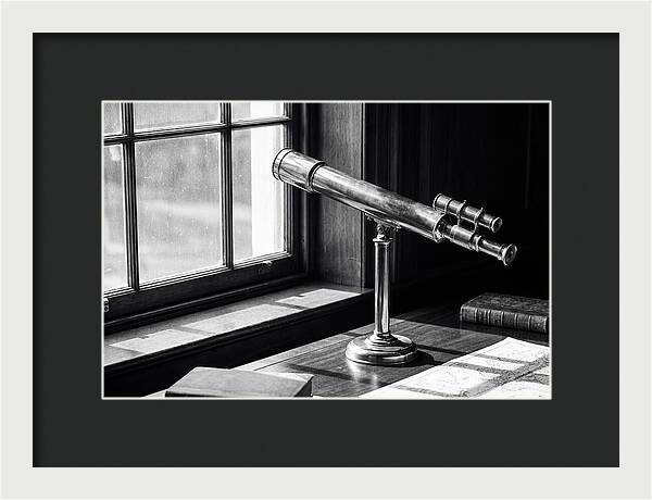 Brass Telescope On Mahogany Desk