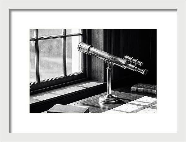 Brass Telescope On Mahogany Desk
