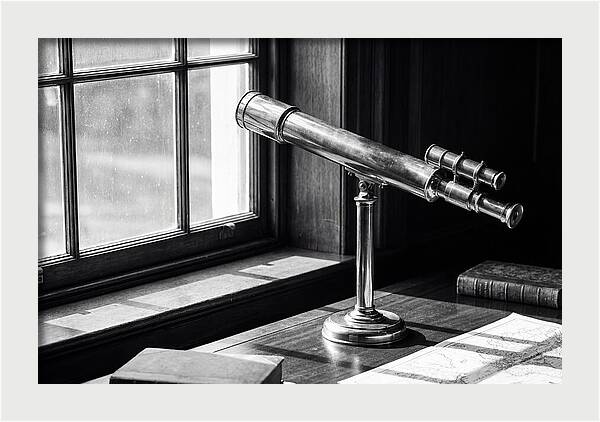 Brass Telescope On Mahogany Desk