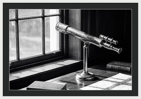Brass Telescope On Mahogany Desk