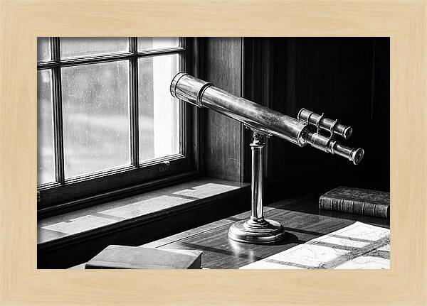 Brass Telescope On Mahogany Desk