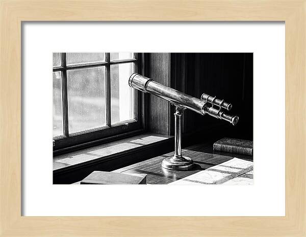 Brass Telescope On Mahogany Desk