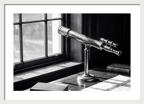 Brass Telescope On Mahogany Desk