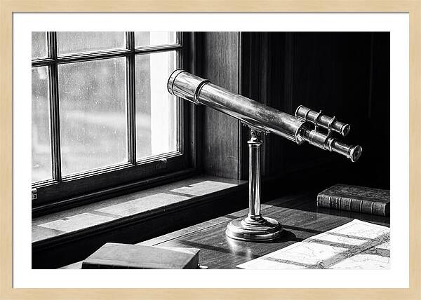 Brass Telescope On Mahogany Desk