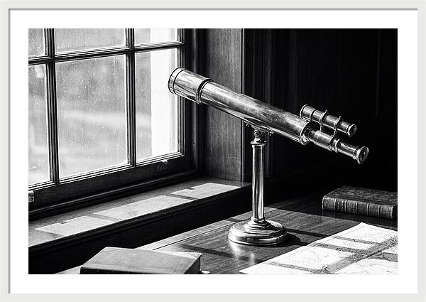 Brass Telescope On Mahogany Desk