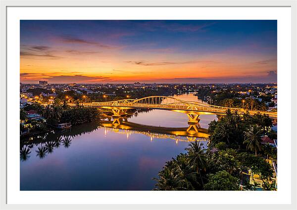 Bridge Over City River At Dusk