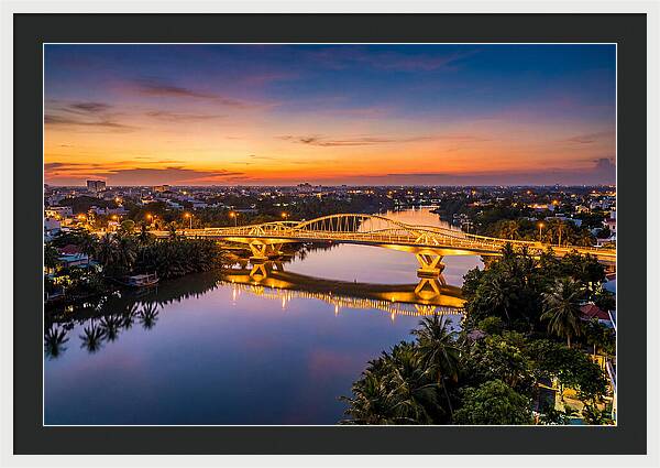 Bridge Over City River At Dusk