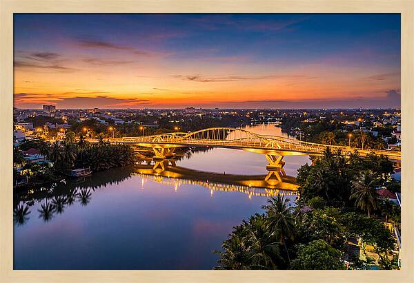 Bridge Over City River At Dusk