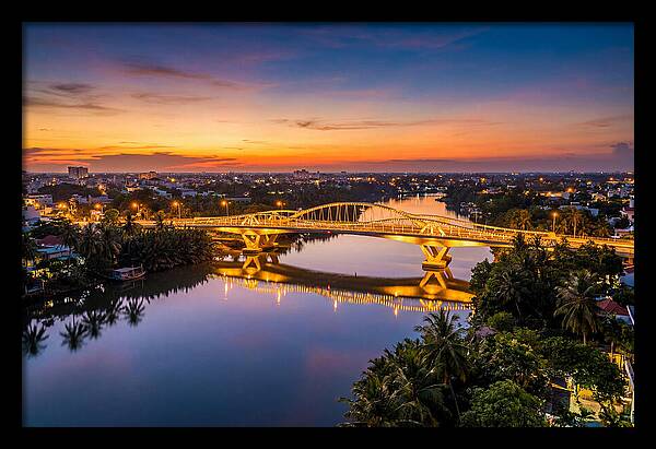 Bridge Over City River At Dusk