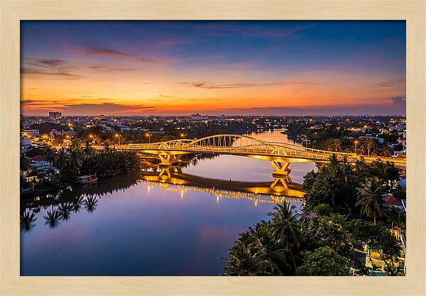 Bridge Over City River At Dusk