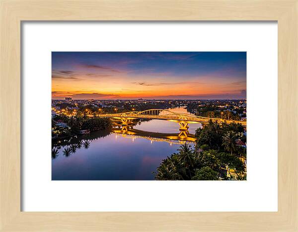 Bridge Over City River At Dusk