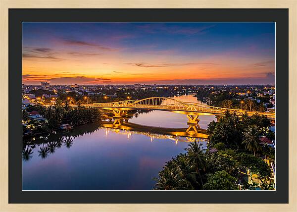 Bridge Over City River At Dusk