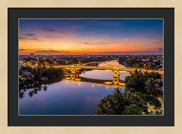 Bridge Over City River At Dusk