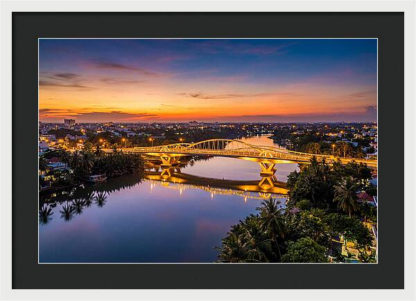 Bridge Over City River At Dusk
