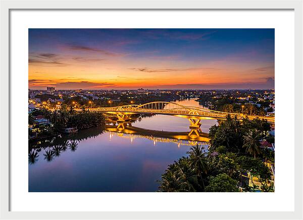 Bridge Over City River At Dusk