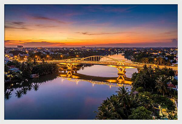 Bridge Over City River At Dusk