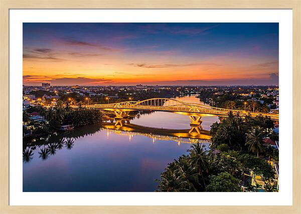 Bridge Over City River At Dusk