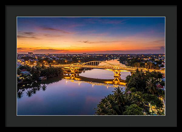 Bridge Over City River At Dusk