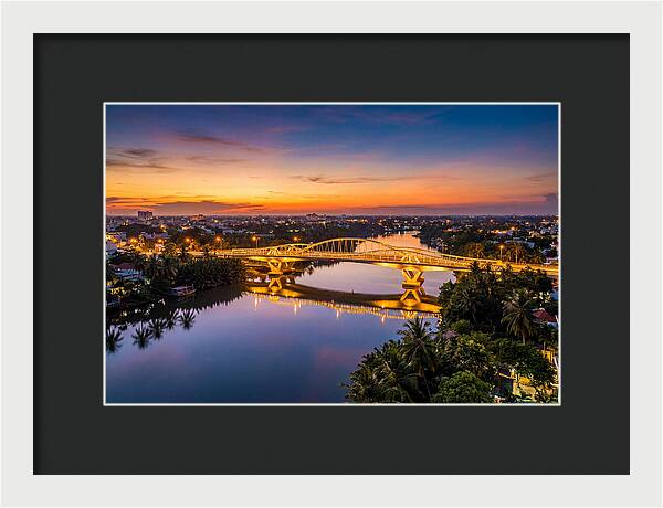 Bridge Over City River At Dusk