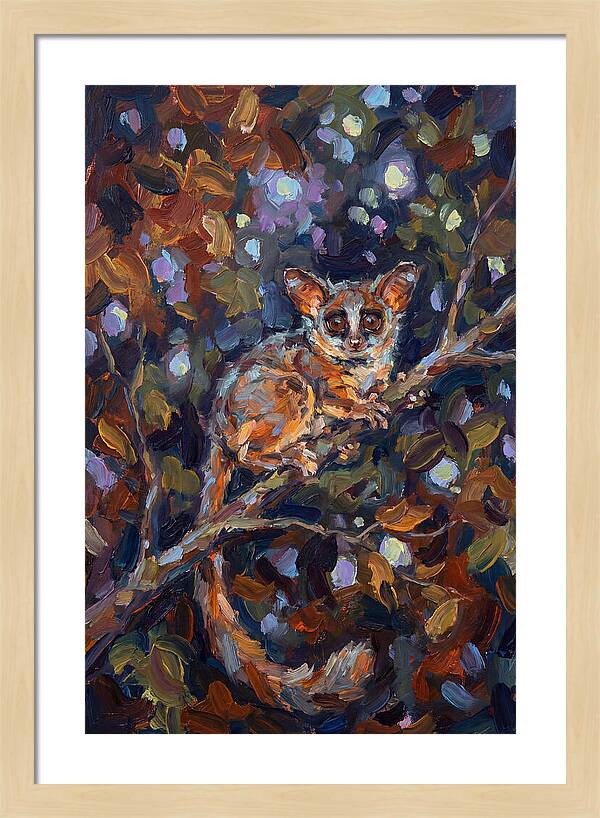 Bushbaby Among Vibrant Foliage