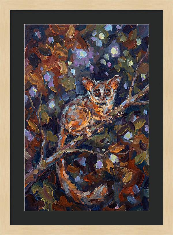 Bushbaby Among Vibrant Foliage